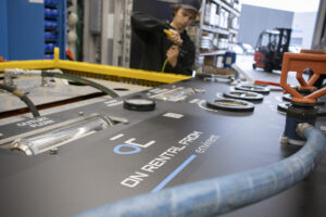Industrienhet med Envirent-logo og merking av tilkoblinger
